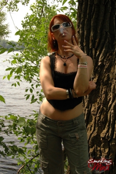 Mina in the woods enjoying a sexy smoking session