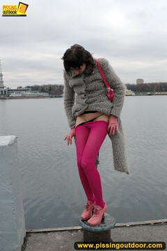 Outdoor pissing on embankment by MILF brunette - N