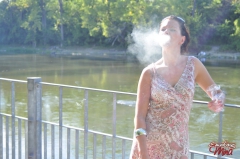 Brunette babe smoking at the riverside - N