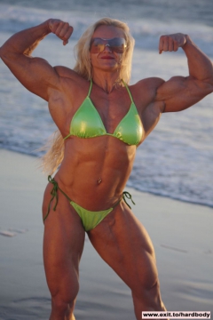 Amazing Muscle Babe posing outdoors - N