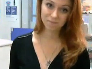 Pretty Redhead Fooling Around At Work