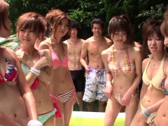 A bunch of Japanese bikini babes have a wrestling match!