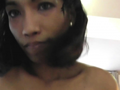 Exotic Asian Girl Covering Face With Cum