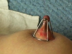 nipple-clamps-and-glowing-wax