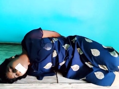 Indian woman hogtied in blue robe